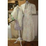 TWO MANIKINS, a Laura Ashley dress and jacket (UK size 12) and a white fur stole