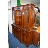 A MODERN MAHOGANY BREAKFRONT DISPLAY CABINET, with arched open centre flanked by two glazed doors to