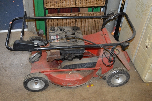 A PETROL LAWN MOWER (no grassbox)