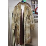 TWO FUR COATS, (2)