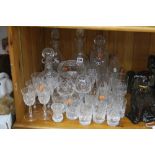 A QUANTITY OF GLASSWARE, including four decanters, vase and tumblers
