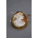 A MID-20TH CENTURY CAMEO BROOCH, oval shell cameo depicting Selene the goddess of the moon,