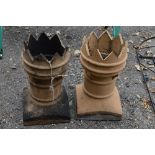 A PAIR OF VINTAGE CASTLATED CHIMNEY POTS, approximate height 60cm