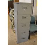 A FIVE DRAWER METAL FILING CABINET