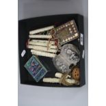 A BOX OF MISCELLANEOUS ORIENTAL ITEMS, including an Indian silver buckle