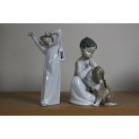 TWO LLADRO FIGURES, boy yawning No.4870 and boy with Dog No.4522 (2)