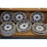 A FIFTEEN PIECE IRONSTONE DESSERT SET, comprising 11 plates, two oval comports and two circular