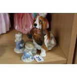 A ROYAL DOULTON FIGURE, Spaniel with Pheasant, HN1028, together with Wade 'Wynken' (chip to base)