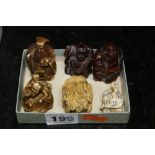 TWO STAINED CARVED WOOD NETSUKE, together with an ivory example and three others resin (6)
