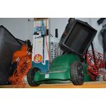 A QUALCAST LAWN MOWER, with grassbox, a Black and Decker hedge trimmer and a Vax Vacuum cleaner with