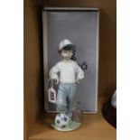 A BOXED LLADRO FIGURE, 'Starting Forward'