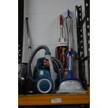 TWO VACUUM CLEANERS, and a steam mop (3)