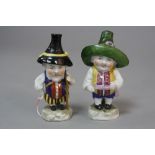 A PAIR OF CONTINENTAL PORCELAIN MANSION HOUSE DWARVES, bearing Pseudo gold anchor marks, height