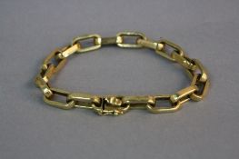 A LATE 20TH CENTURY OPEN LINK BRACELET, rectangular textured links, bracelet measuring approximately