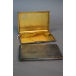 TWO GEORGE VI RECTANGULAR SILVER CIGARETTE CASES, both engine turned decoration, maker E.J.