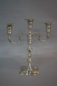 AN ELIZABETH II SILVER CANDELABRUM OF GEORGE II STYLE, three light, detachable sconces, knopped