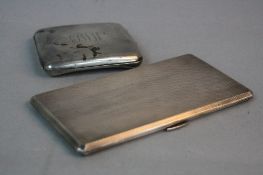 A GEORGE VI RECTANGULAR SILVER CIGARETTE CASE, engine turned decoration, canted corners, bears