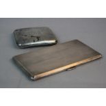 A GEORGE VI RECTANGULAR SILVER CIGARETTE CASE, engine turned decoration, canted corners, bears