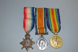 WWII TRIO OF MEDALS, on a loose wearing bar, consisting 1914-15 Star, correctly named to 13920 Pte