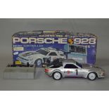 A BOXED PORSCHE 928 BATTERY OPERATED RADIO CONTROL RACING CAR, No.555SC, made for Schuco ?, no