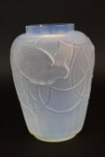 A SABINO OPALESCENT GLASS BALUSTER VASE, moulded in relief with three Parakeets within interlinked
