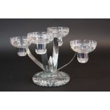 A STUART CRYSTAL AND CHROME ART DECO STYLE FOUR BRANCH EPERGNE, circular cut glass candle holders on