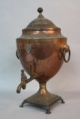 A 19TH CENTURY COPPER SAMOVAR OF NEO-CLASSICAL STYLE, ball finial on a domed cover above an urn