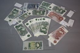 A SELECTION OF BANK OF ENGLAND BANKNOTES, to include most uncirculated Hollom five pound ROI Page