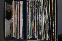 TWO CASES CONTAINING OVER 70 L.P'S AND 12'' SINGLES, artists include Led Zepplin, Rush, Yes, Blue