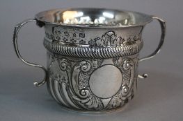 A LATE VICTORIAN SILVER LOVING CUP IN EARLY 18TH CENTURY STYLE, twin 'S' scroll handles, the
