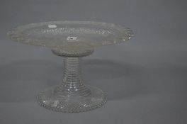 A VICTORIAN CUT GLASS TWO PIECE TAZZA, the rim with a shell design and hobnail cut, the base with