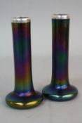 A PAIR OF EARLY 20TH CENTURY IRIDESCENT PURPLE GLASS ONION SHAPED VASES, in the style of Tiffany,