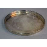 AN ELIZABETH II CIRCULAR SILVER GALLERIED TRAY, engraved initials verso, makers mark for Barker
