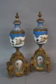 A PAIR OF LATE 19TH CENTURY PORCELAIN AND GILT METAL GARNITURES, of urn form, turquoise ground