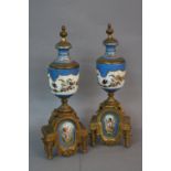 A PAIR OF LATE 19TH CENTURY PORCELAIN AND GILT METAL GARNITURES, of urn form, turquoise ground