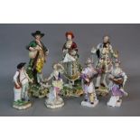 SEVEN 19TH CENTURY CONTINENTAL PORCELAIN FIGURES OF LADIES AND GENTLEMAN, the largest pair bearing