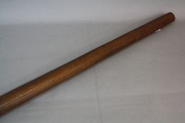 TRIBAL INTEREST, a hardwood cylindrical club carved with geometric motifs throughout, both ends with