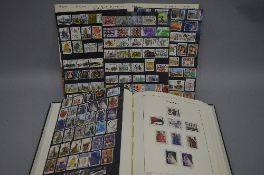 A COLLECTION OF GREAT BRITISH STAMPS, in a Lighthouse album and loose