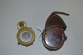 A WWI ERA BRITISH ARMY FIELD COMPASS, by French & Son Ltd London, dated 1917, numbered 80860,