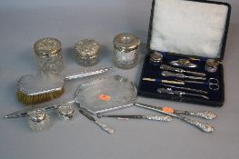 A GROUP LOT OF SILVER TOPPED GLASS DRESSING TABLE JARS, cased and loose manicure accessories, silver