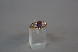 A LATE VICTORIAN HALF HOOP AMETHYST AND DIAMOND DRESS RING, estimated total rose cut diamond