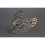 A LATE 20TH CENTURY WHITE METAL AND GLASS SWAN DISH, hinged wings, height approximately 9.5cm