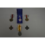 A SMALL COLLECTION OF GERMAN WWII MEDALS, consisting of a Mothers Cross, in original box in