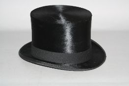 AN EARLY 20TH CENTURY BLACK SILK TOP HAT, by Tress & Co London for Rufus Sanderson Ltd of Leeds,