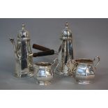 A GEORGE V GOLDSMITHS AND SILVERSMITHS COMPANY LIMITED FOUR PIECE SILVER CAFE AU LAIT SET, octagonal