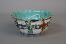 A 19TH CENTURY CHINESE PORCELAIN BOWL, wavy rim, turquoise glazed interior, the exterior painted