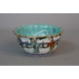 A 19TH CENTURY CHINESE PORCELAIN BOWL, wavy rim, turquoise glazed interior, the exterior painted