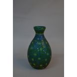 A 20TH CENTURY PEKING STYLE GLASS CAMEO VASE, of baluster form, tri-colour, green and yellow over