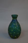 A 20TH CENTURY PEKING STYLE GLASS CAMEO VASE, of baluster form, tri-colour, green and yellow over