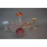 A PAIR OF LATE 19TH CENTURY SPHERICAL GLASS VASES, with flower shaped rim with alternate pink and